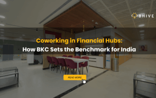 Modern coworking space interior at BHIVE BKC with seating area, meeting tables, and collaborative workspace setup.