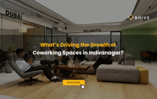 Professionals collaborating in a modern BHIVE coworking lounge in Indiranagar, highlighting flexible workspaces and community-driven work culture.