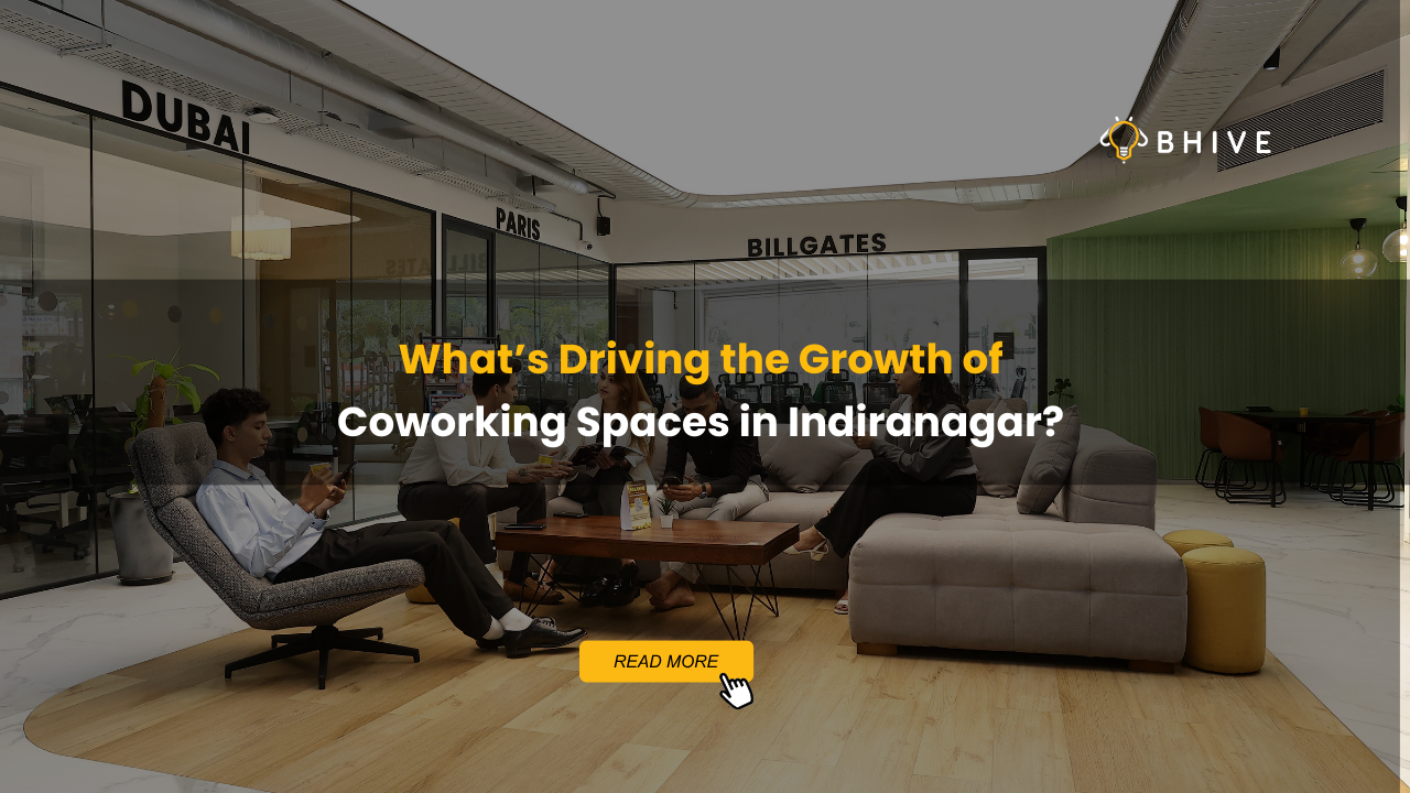 Professionals collaborating in a modern BHIVE coworking lounge in Indiranagar, highlighting flexible workspaces and community-driven work culture.