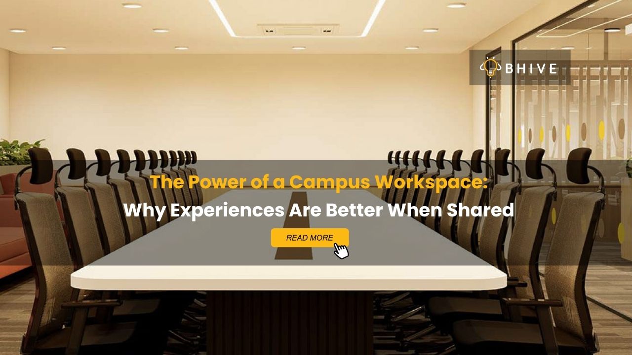 Modern conference room with a long meeting table and chairs, overlaid with the text “The Power of a Campus Workspace: Why Experiences Are Better When Shared” and a “Read More” button with BHIVE branding.