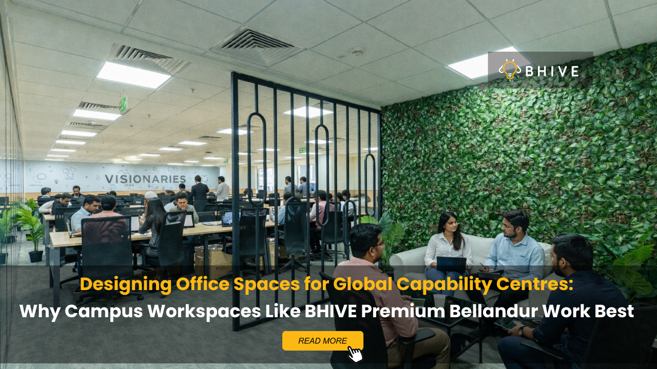 Busy coworking office at BHIVE Premium Bellandur campus showing professionals working at desks and collaborating in lounge area, representing an ideal workspace for Global Capability Centres.
